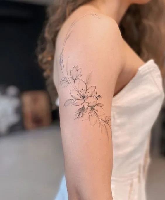 The Ultimate Guide to Elegant Arm Tattoo Designs for Women 4 Fine Line Tattoos