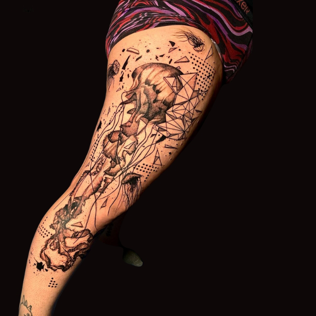 Unique and Cool Arm Tattoo Designs for Men to Show Your Personality 7 Trash Polka and Avant-Garde